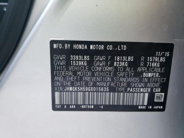 Photo 9 VIN: JHMGK5H59GX015635 - HONDA FIT LX 