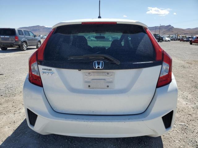 Photo 5 VIN: JHMGK5H59GX021578 - HONDA FIT LX 