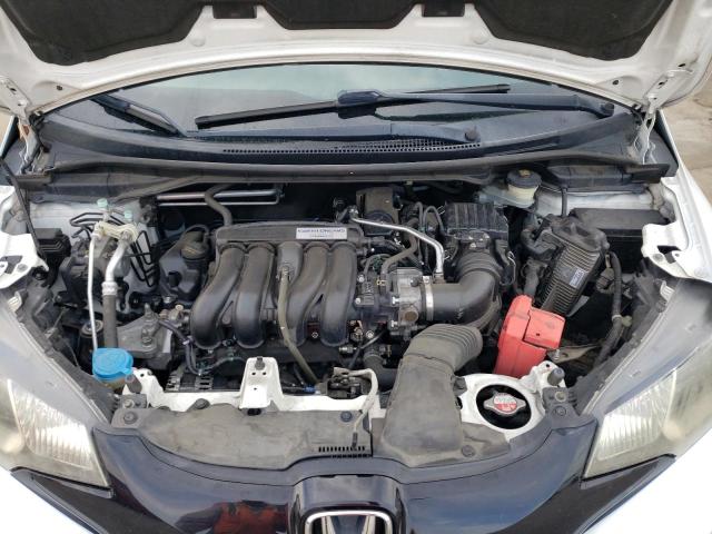 Photo 10 VIN: JHMGK5H59GX021886 - HONDA FIT LX 