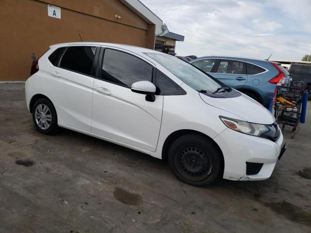 Photo 3 VIN: JHMGK5H59GX021886 - HONDA FIT LX 