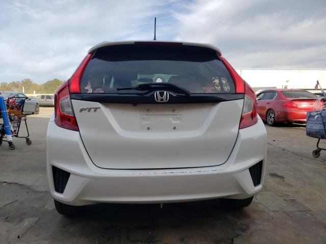 Photo 5 VIN: JHMGK5H59GX021886 - HONDA FIT LX 