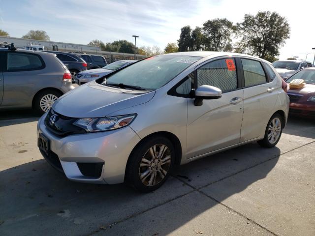 Photo 1 VIN: JHMGK5H59GX027574 - HONDA FIT LX 