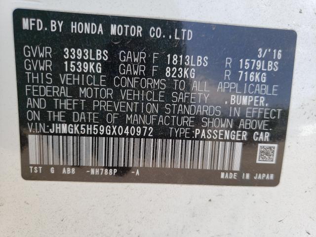 Photo 9 VIN: JHMGK5H59GX040972 - HONDA FIT LX 