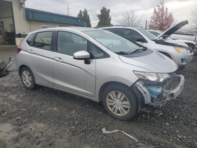 Photo 3 VIN: JHMGK5H5XGS004284 - HONDA FIT LX 