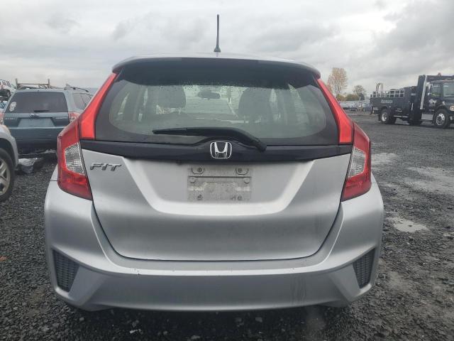 Photo 5 VIN: JHMGK5H5XGS004284 - HONDA FIT LX 