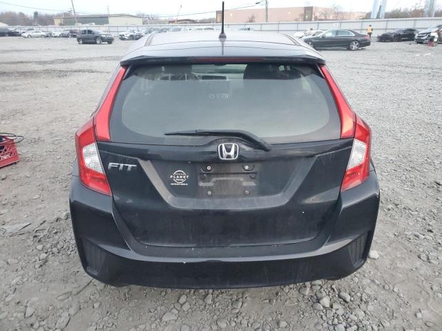 Photo 5 VIN: JHMGK5H5XGS005970 - HONDA FIT LX 