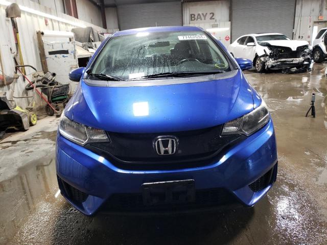 Photo 4 VIN: JHMGK5H5XGX002943 - HONDA FIT LX 