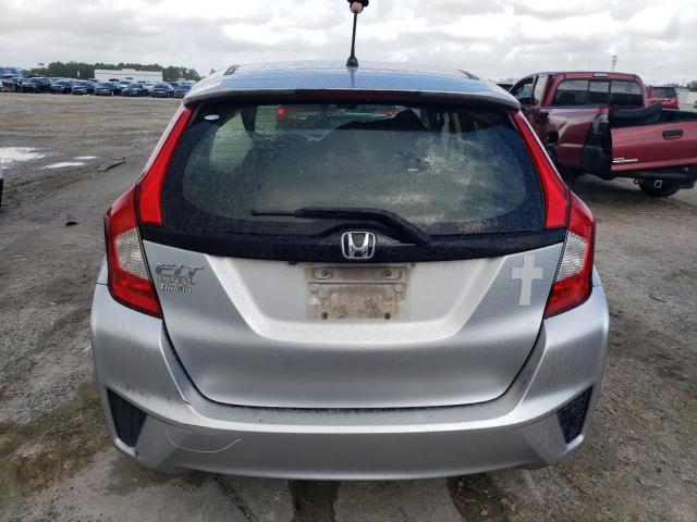 Photo 5 VIN: JHMGK5H5XGX015594 - HONDA FIT LX 