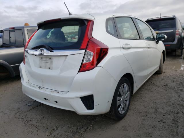 Photo 3 VIN: JHMGK5H5XGX021296 - HONDA FIT LX 