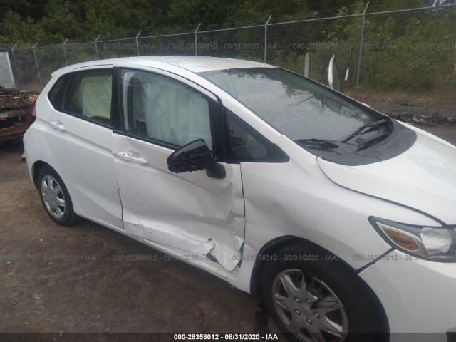 Photo 5 VIN: JHMGK5H5XGX026739 - HONDA FIT 