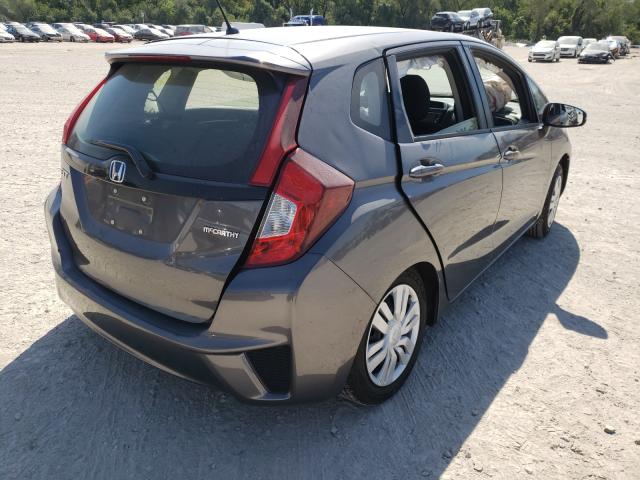 Photo 3 VIN: JHMGK5H5XGX031228 - HONDA FIT LX 