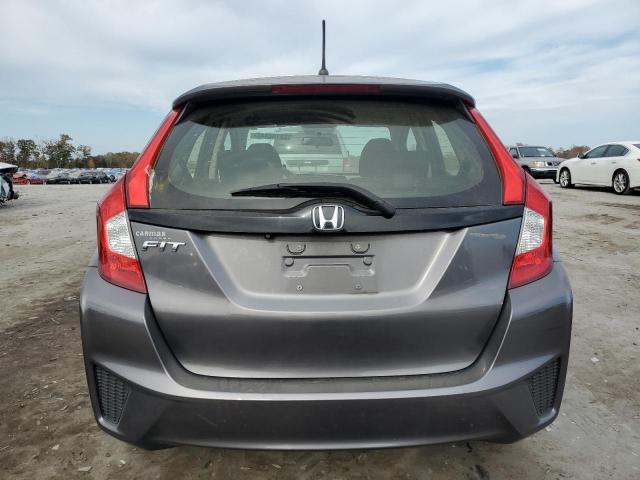 Photo 5 VIN: JHMGK5H5XGX034811 - HONDA FIT LX 