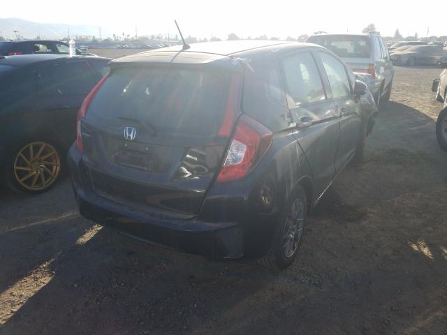 Photo 3 VIN: JHMGK5H5XHS005193 - HONDA FIT LX 