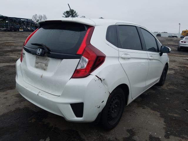 Photo 3 VIN: JHMGK5H5XHS007980 - HONDA FIT LX 