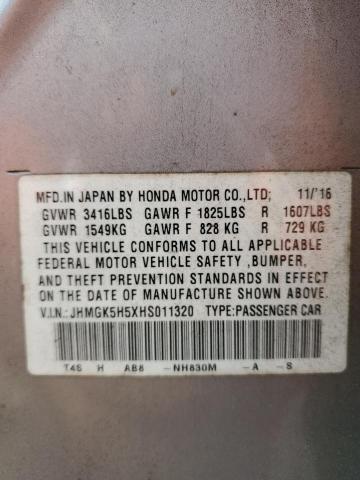 Photo 11 VIN: JHMGK5H5XHS011320 - HONDA FIT LX 