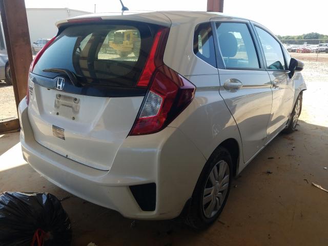 Photo 3 VIN: JHMGK5H5XHS018929 - HONDA FIT LX 