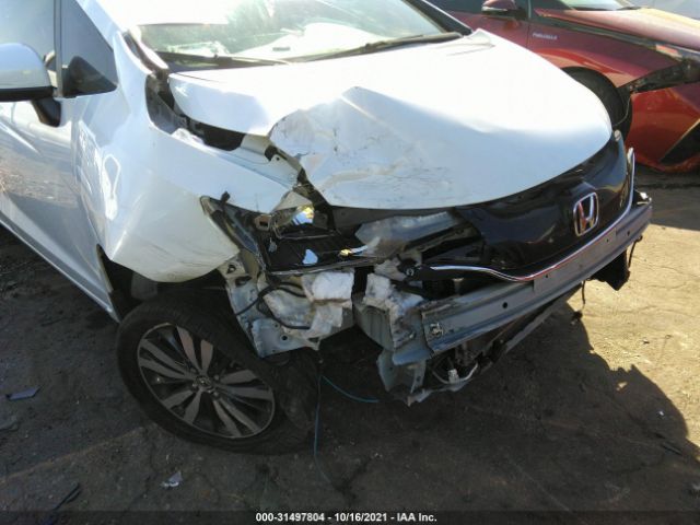 Photo 5 VIN: JHMGK5H70GX001432 - HONDA FIT 