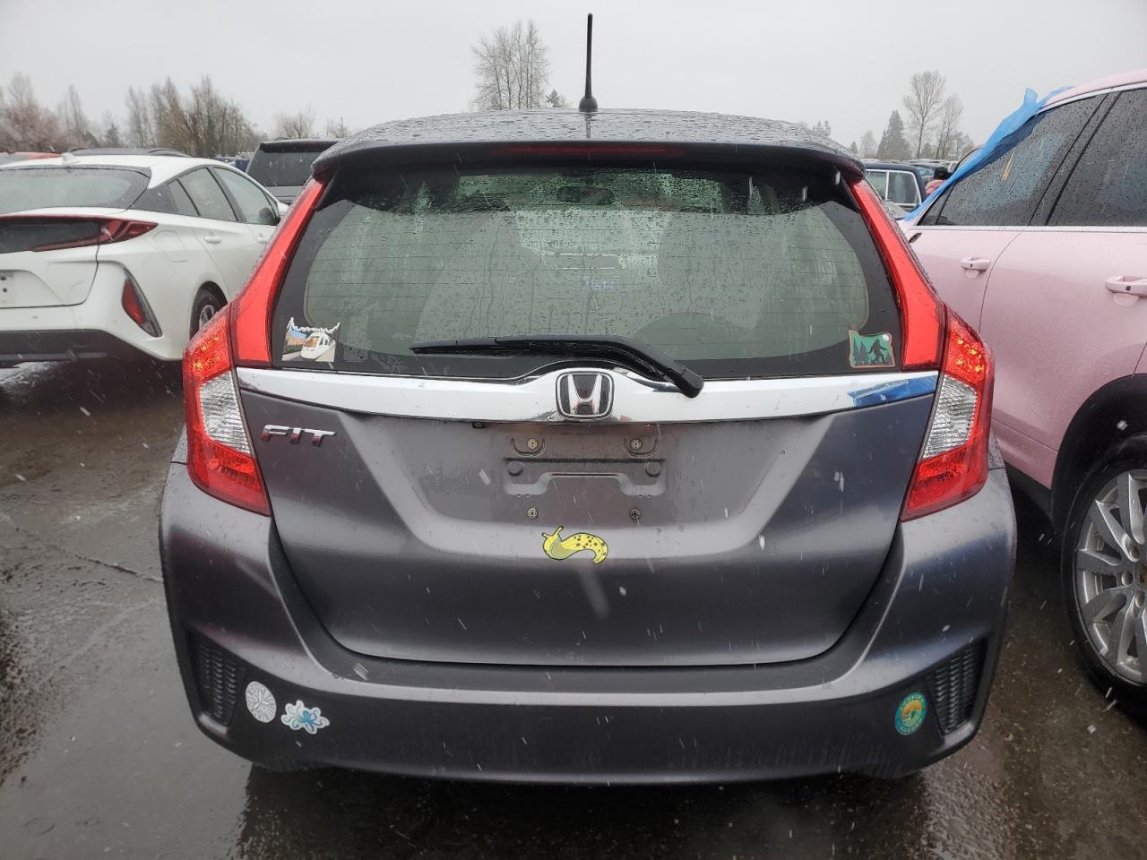 Photo 5 VIN: JHMGK5H70GX040781 - HONDA FIT 