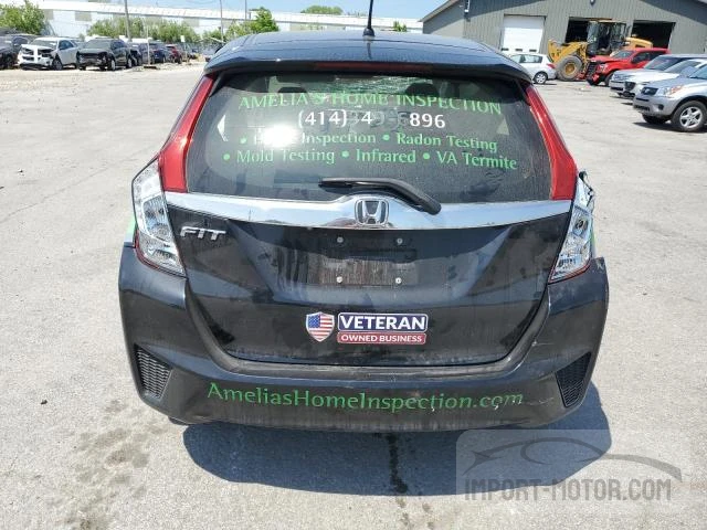 Photo 5 VIN: JHMGK5H71GX046007 - HONDA FIT 