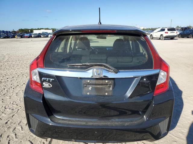 Photo 5 VIN: JHMGK5H73GX042461 - HONDA FIT 