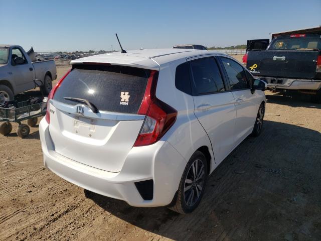 Photo 3 VIN: JHMGK5H74GX000039 - HONDA FIT EX 