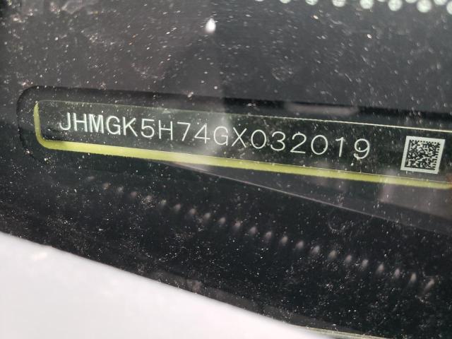 Photo 12 VIN: JHMGK5H74GX032019 - HONDA FIT EX 