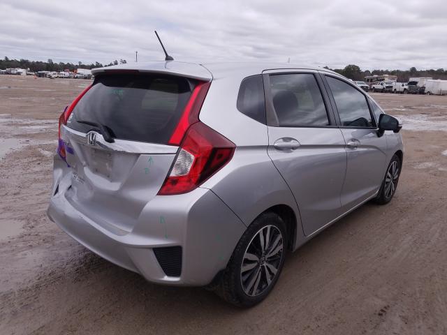 Photo 3 VIN: JHMGK5H74GX042064 - HONDA FIT EX 