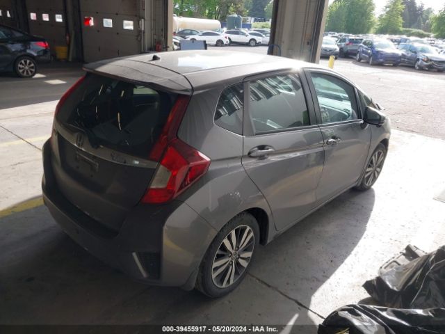 Photo 3 VIN: JHMGK5H75GS000080 - HONDA FIT 