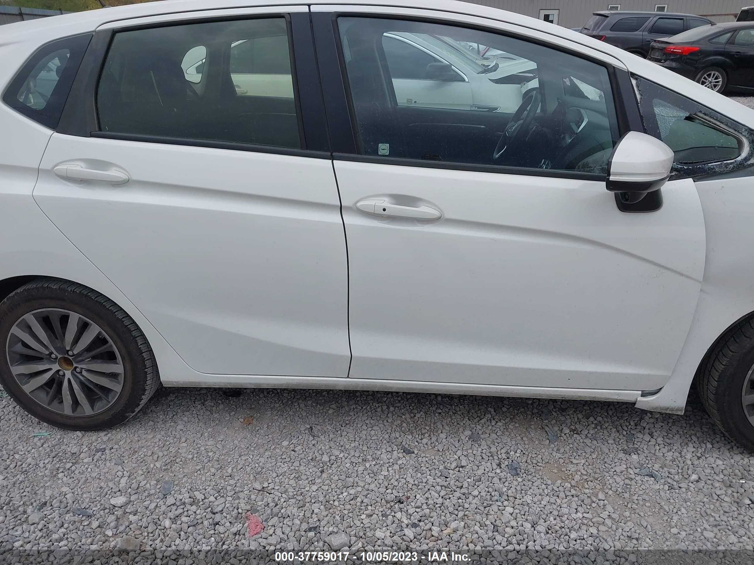 Photo 12 VIN: JHMGK5H75GX031039 - HONDA FIT 