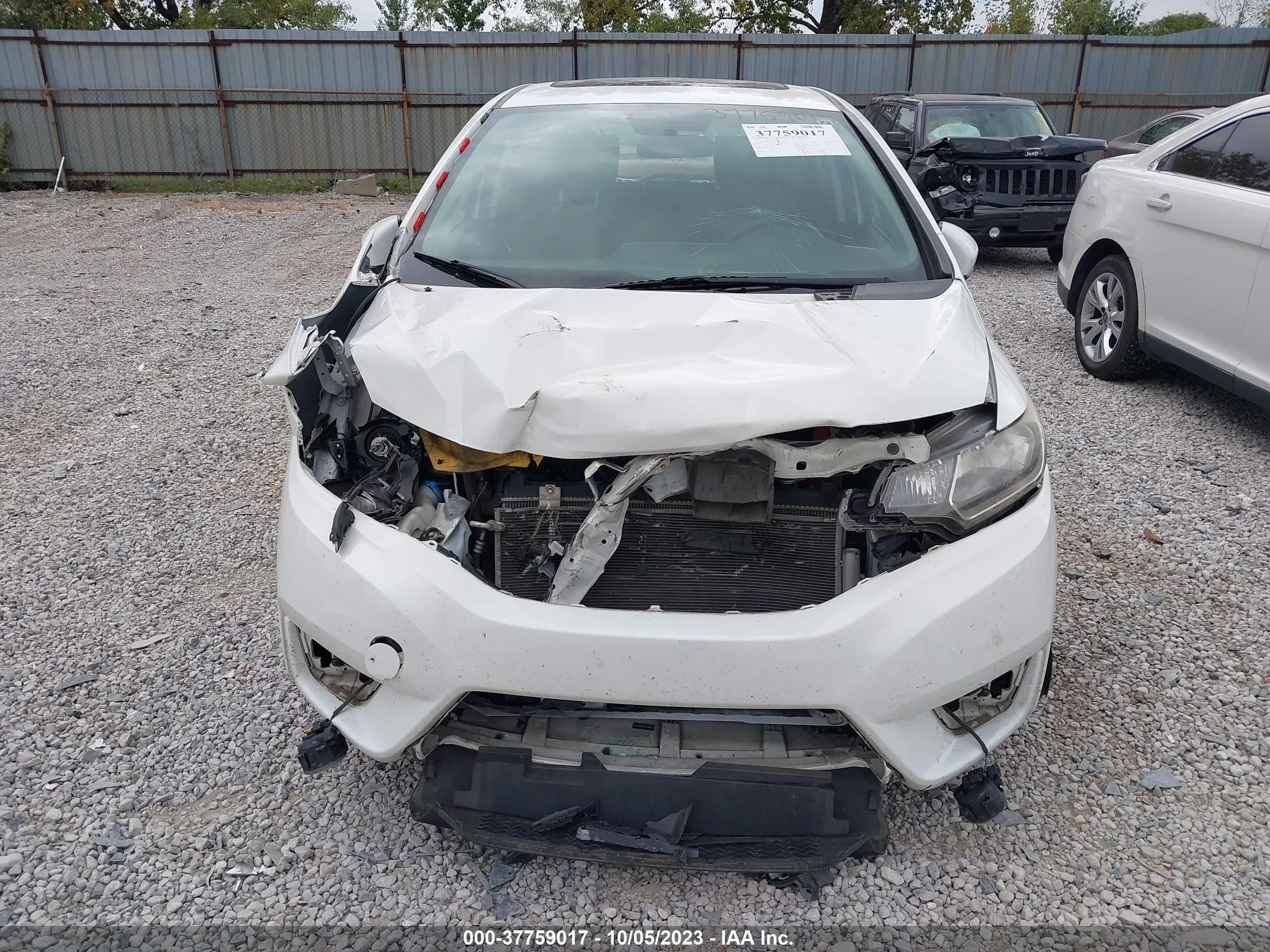 Photo 5 VIN: JHMGK5H75GX031039 - HONDA FIT 