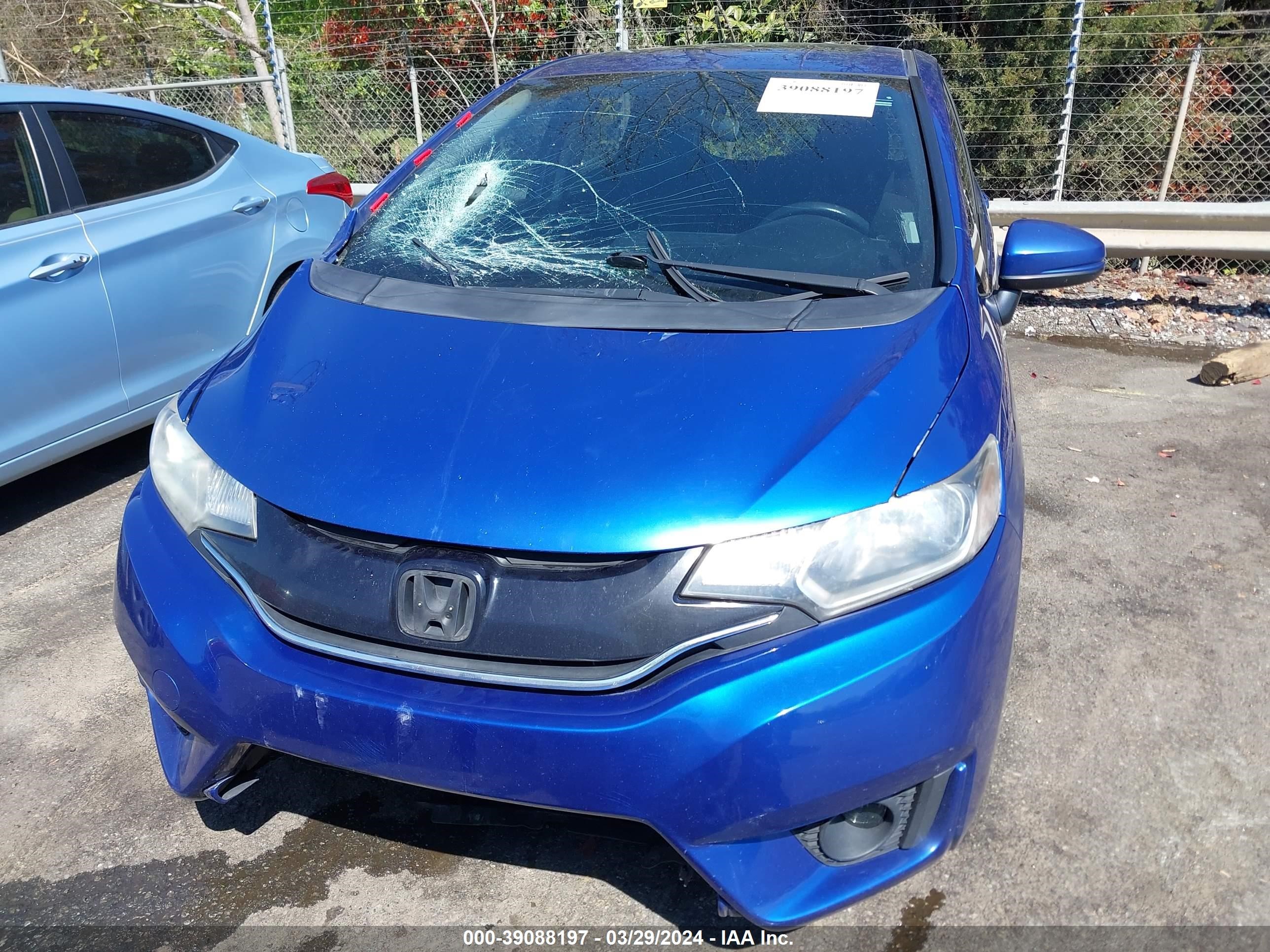 Photo 11 VIN: JHMGK5H76GX030658 - HONDA FIT 