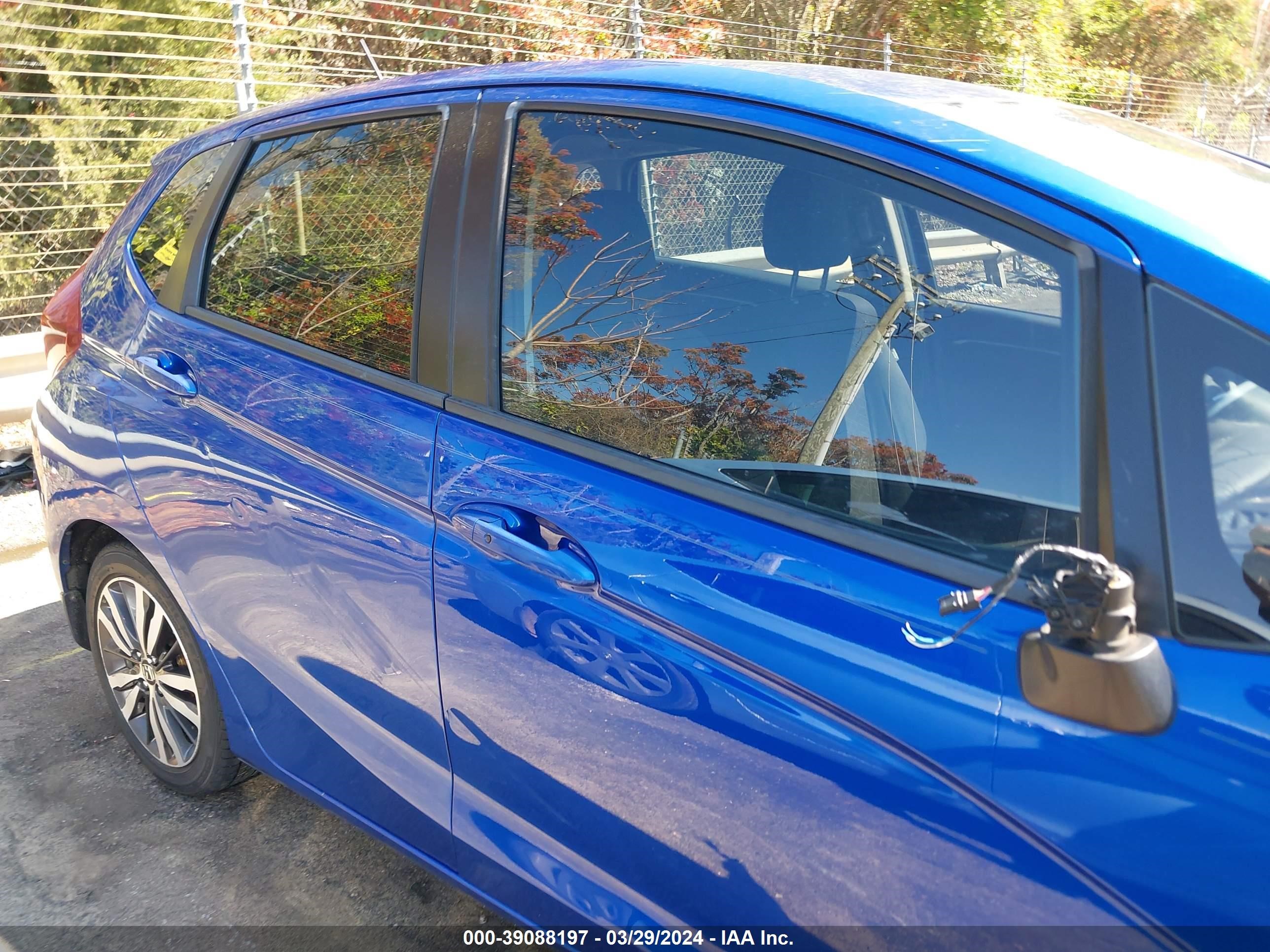 Photo 12 VIN: JHMGK5H76GX030658 - HONDA FIT 