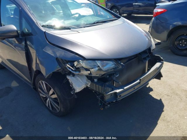 Photo 5 VIN: JHMGK5H76GX037609 - HONDA FIT 