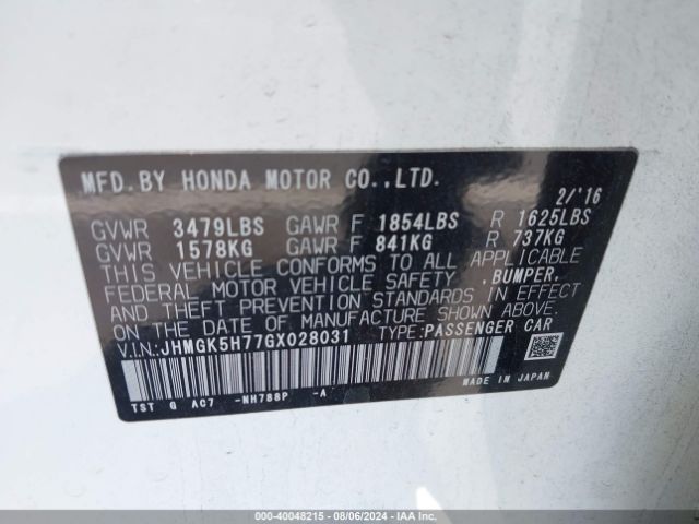 Photo 8 VIN: JHMGK5H77GX028031 - HONDA FIT 