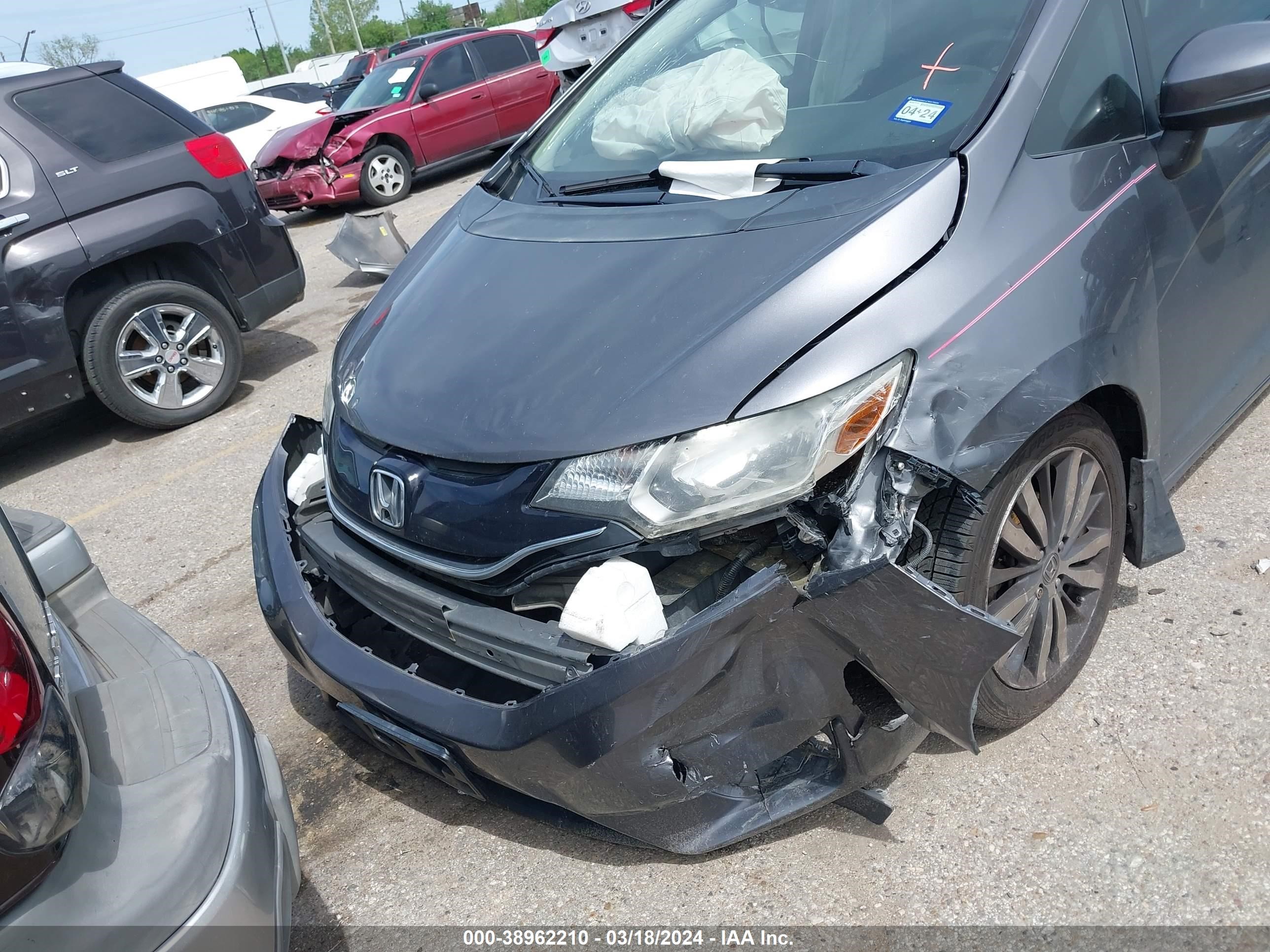 Photo 5 VIN: JHMGK5H77GX040356 - HONDA FIT 