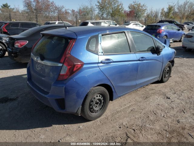 Photo 3 VIN: JHMGK5H77GX041829 - HONDA FIT 