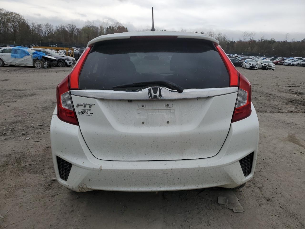 Photo 5 VIN: JHMGK5H77GX042298 - HONDA FIT 