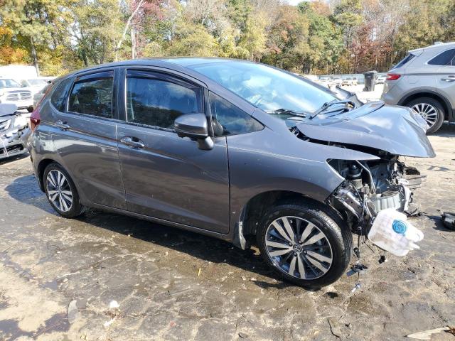 Photo 3 VIN: JHMGK5H78GS000509 - HONDA FIT 