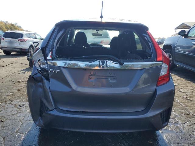 Photo 5 VIN: JHMGK5H78GS000509 - HONDA FIT 