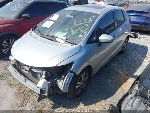 Photo 1 VIN: JHMGK5H78GX037076 - HONDA FIT 