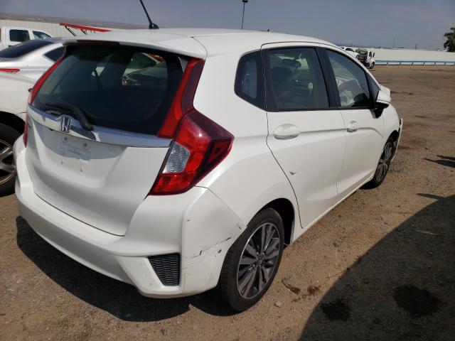 Photo 3 VIN: JHMGK5H79GX021419 - HONDA FIT EX 