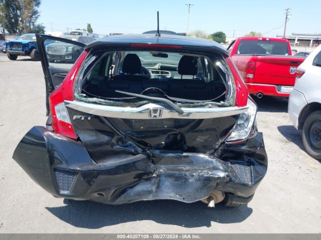 Photo 5 VIN: JHMGK5H79GX031870 - HONDA FIT 