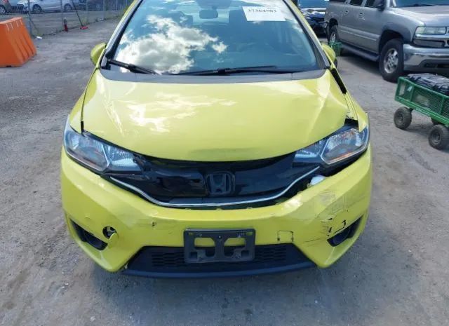 Photo 5 VIN: JHMGK5H7XGS013424 - HONDA FIT 