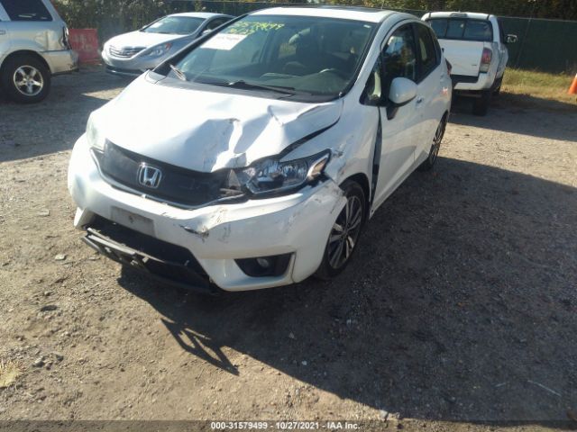 Photo 5 VIN: JHMGK5H7XGX019582 - HONDA FIT 