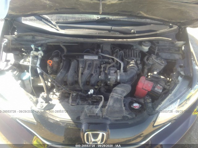 Photo 9 VIN: JHMGK5H8XGS014565 - HONDA FIT 