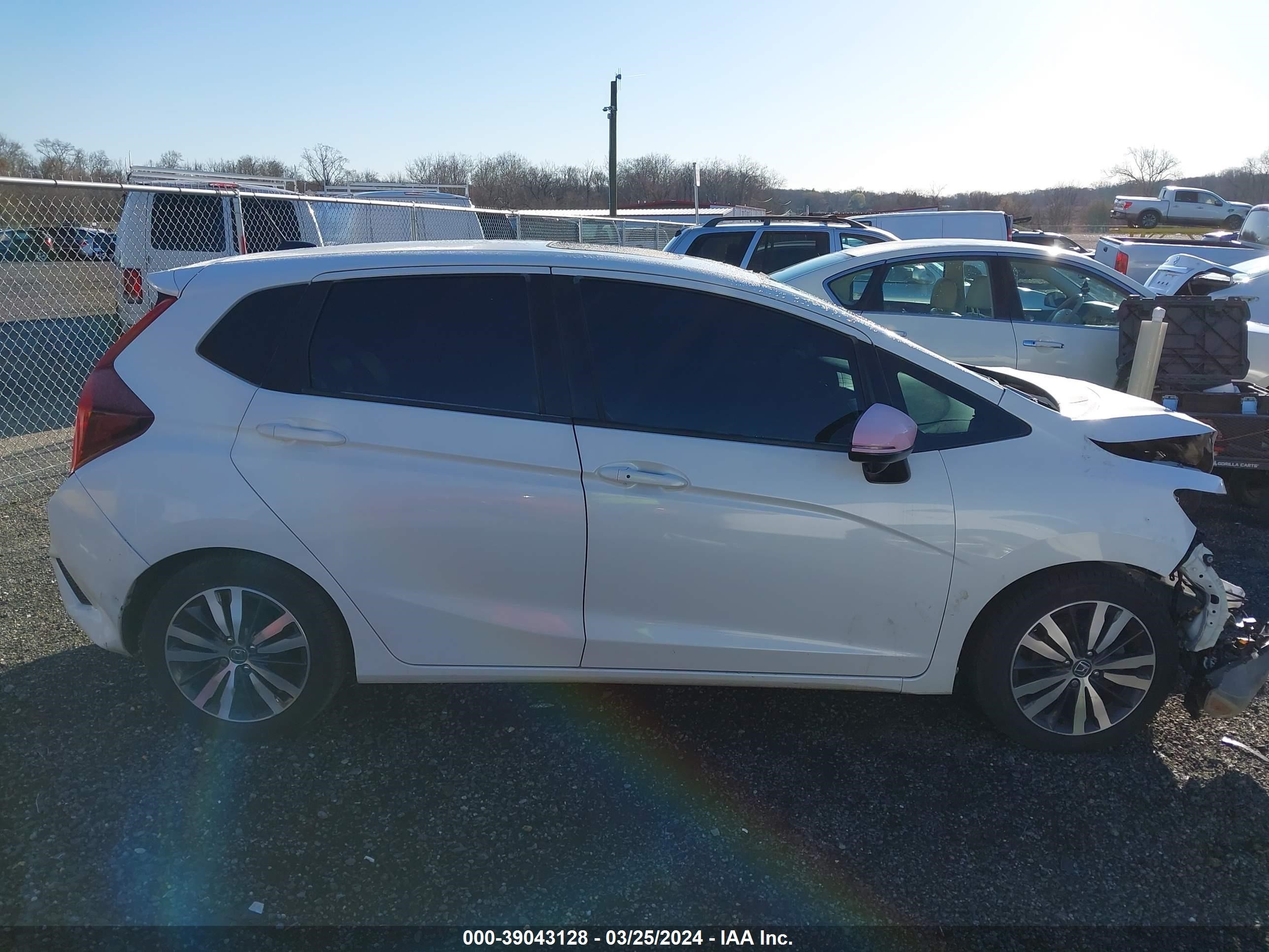 Photo 13 VIN: JHMGK5H90HS006999 - HONDA FIT 