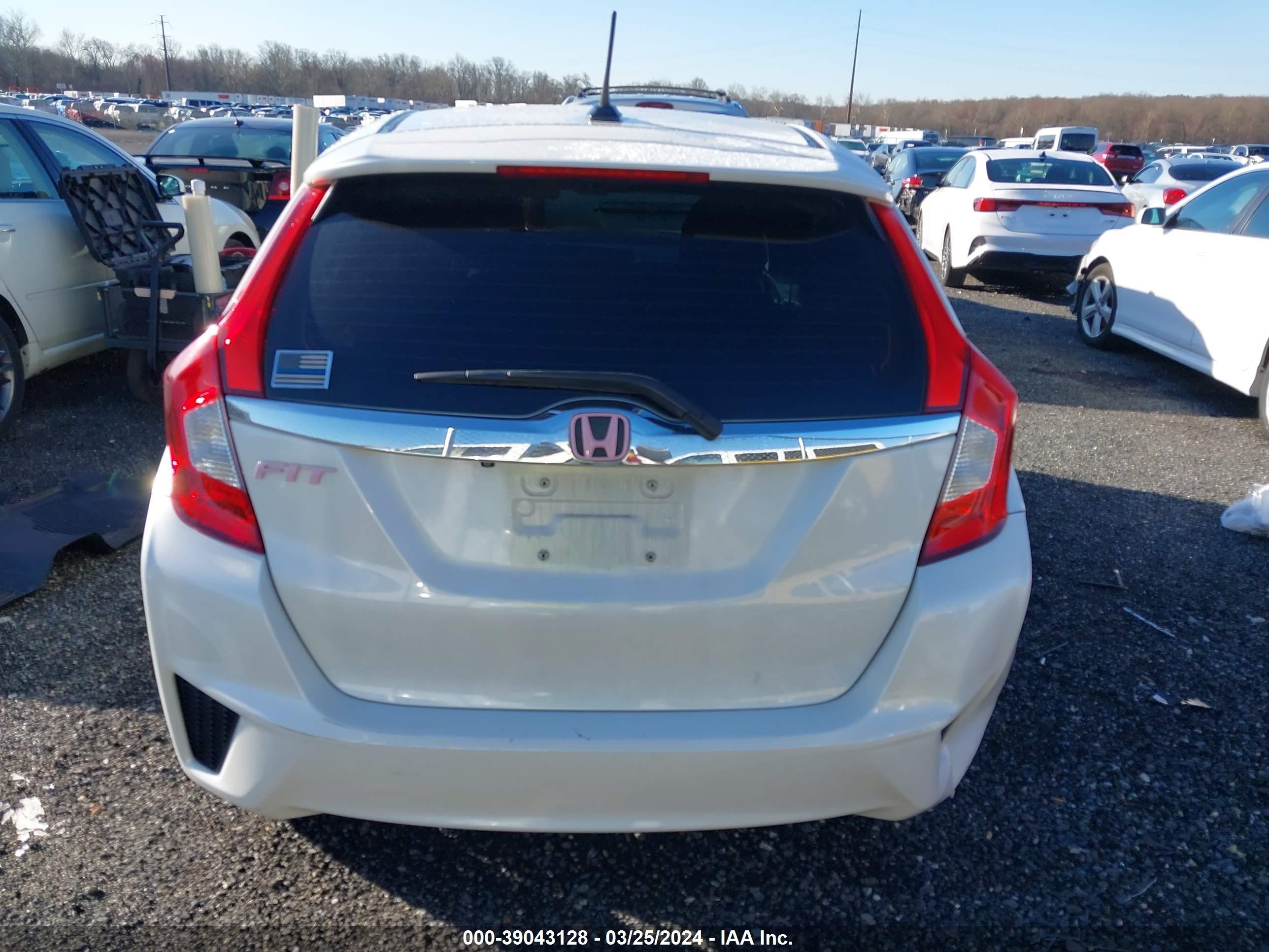 Photo 16 VIN: JHMGK5H90HS006999 - HONDA FIT 