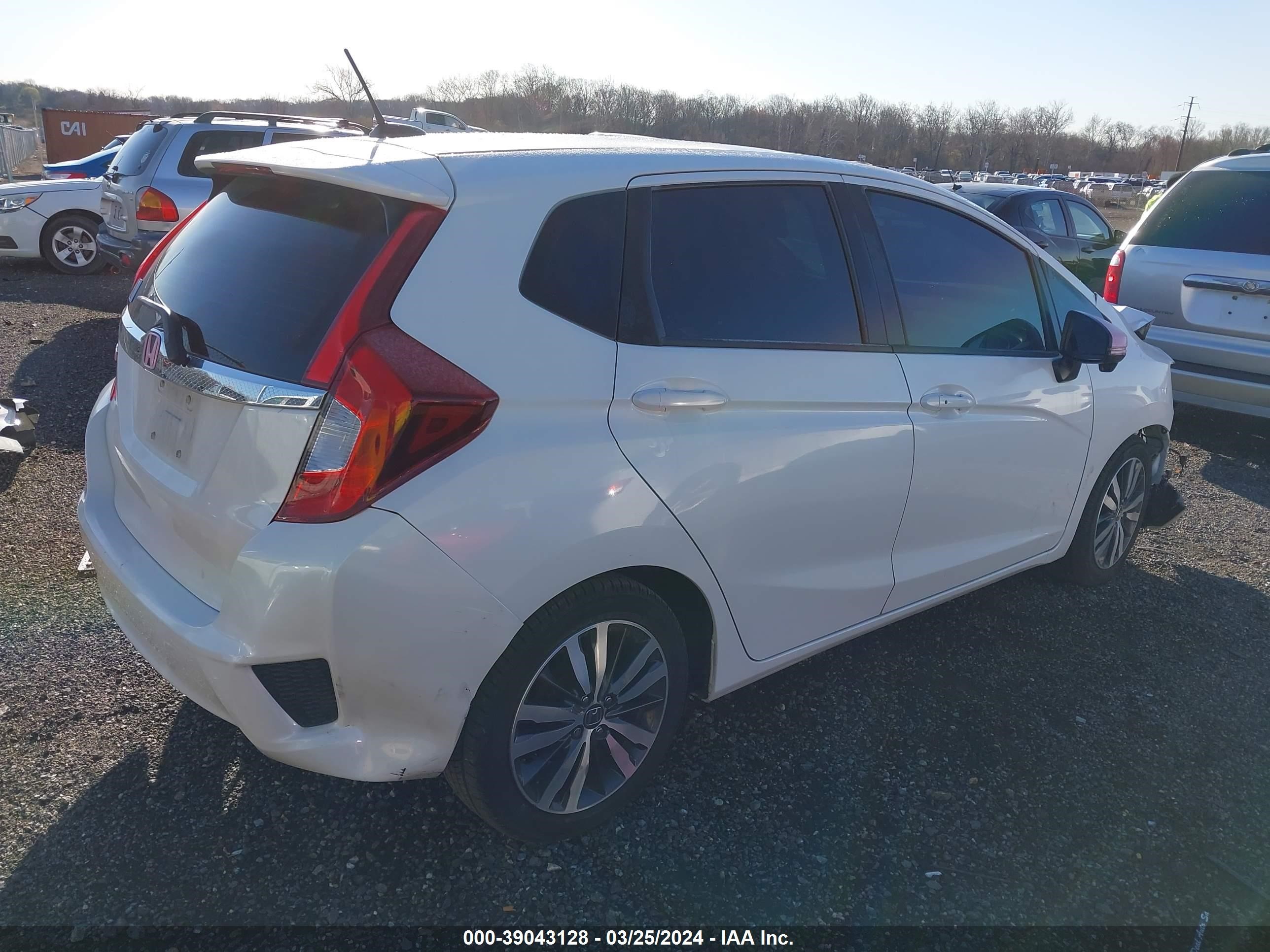 Photo 3 VIN: JHMGK5H90HS006999 - HONDA FIT 