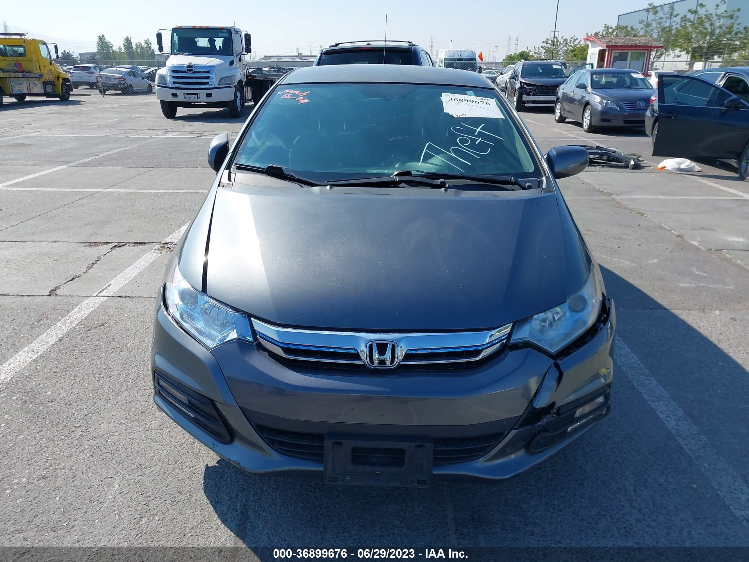 Photo 11 VIN: JHMZE2H32CS000334 - HONDA INSIGHT 