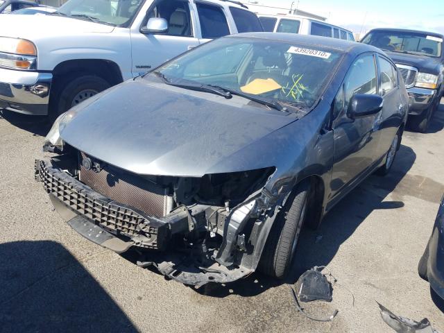 Photo 1 VIN: JHMZE2H71BS001802 - HONDA INSIGHT EX 